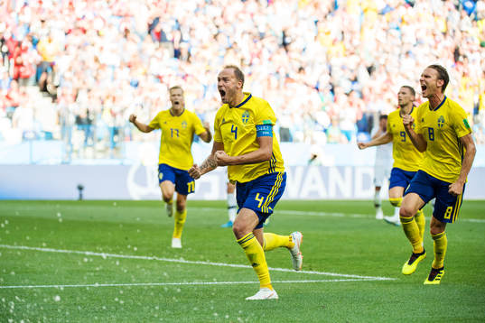 Andreas Granqvist of Sweden celebrates together with