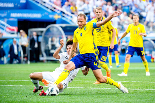 Younggwon Kim of South Korea against Andreas Granqvist of