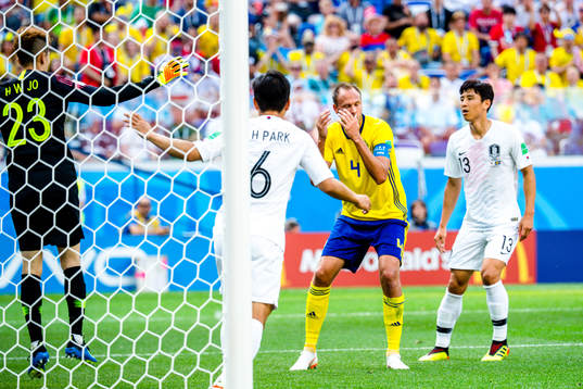 Andreas Granqvist of Sweden looks dejected