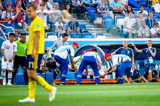 Jooho Park of South Korea with a injury