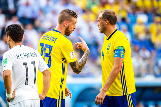 Pontus Jansson and Andreas Granqvist of Sweden