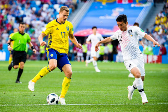 Viktor Claesson of Sweden and Minwoo Kim of South Korea