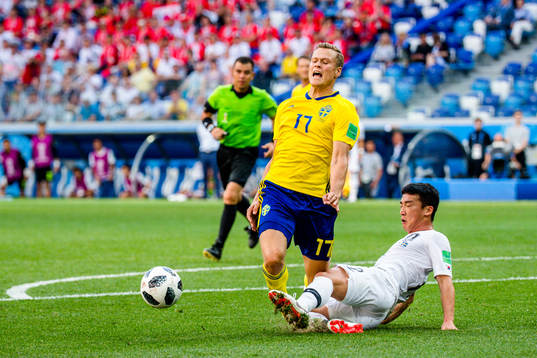 Viktor Claesson of Sweden and Minwoo Kim of South Korea