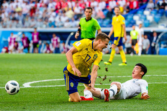 Viktor Claesson of Sweden and Minwoo Kim of South Korea