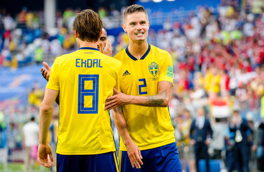 Albin Ekdal and Mikael Lustig of Sweden celebrates