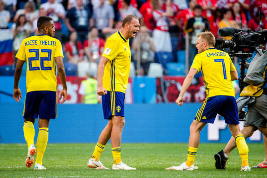 Andreas Granqvist and Sebastian Larsson of Sweden celebrates