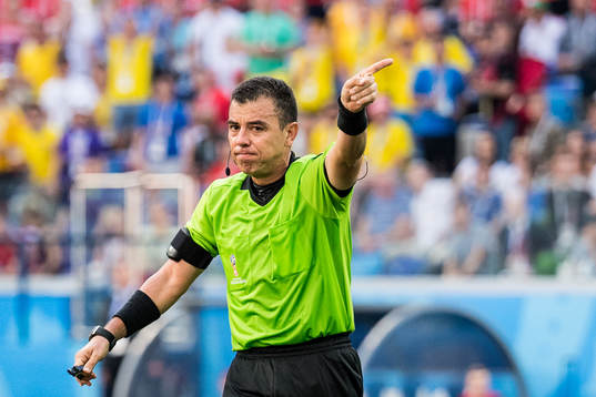 Referee Joel Aguilar