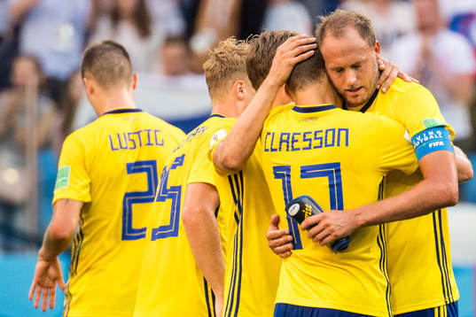Andreas Granqvist and Viktor Claesson of Sweden celebrates