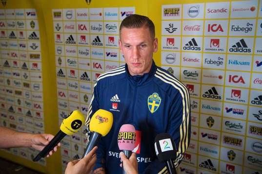 Robin Olsen of the Swedish national football team is being