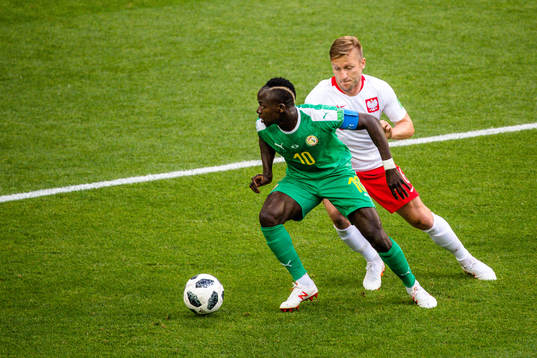 Sadio Mane of Senegal and Jacek Goralski of Poland