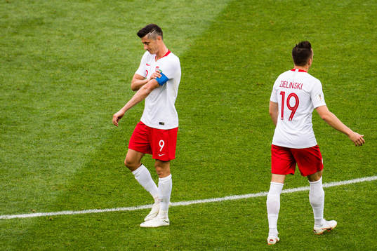 Robert Lewandowski of Poland looks dejected