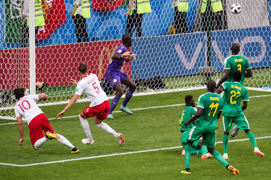 Grzegorz Krychowiak of Poland scores the 1-2 goal behind