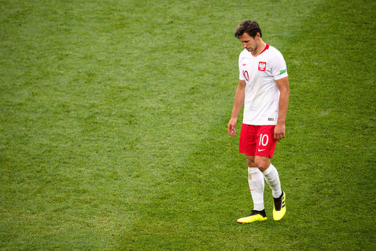 Grzegorz Krychowiak of Poland looks dejected