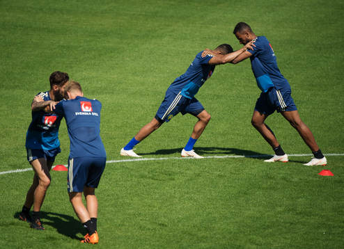 Martin Olsson and Isaac Kiese Thelin of the Swedish