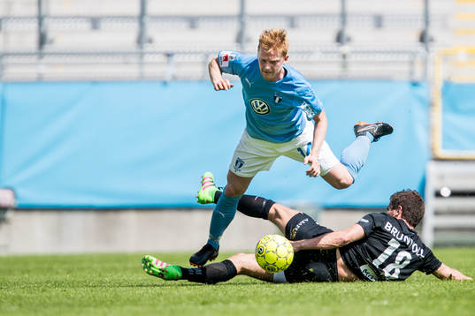 Malmö FFs Anders Christiansen och Moldes +mo18+under en
