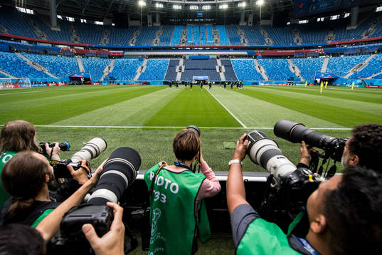 Photographers cover a practice session with team Brazil
