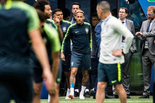 Neymar of Brazil arrives to a practice session