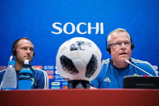 Andreas Granqvist and head coach Janne Andersson of the