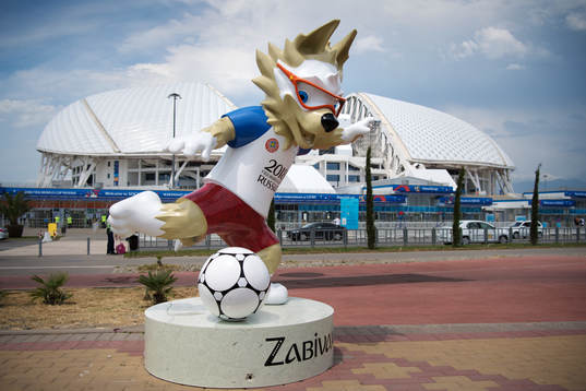 The 2018 World Cup mascot Zabivaka in front of Fisht Stadium