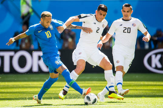 Neymar of Brazil and Johnny Acosta of Costa Rica