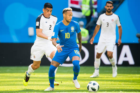 Neymar of Brazil and Johnny Acosta of Costa Rica