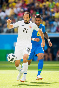 Marcos Urena of Costa Rica and Willian of Brazil
