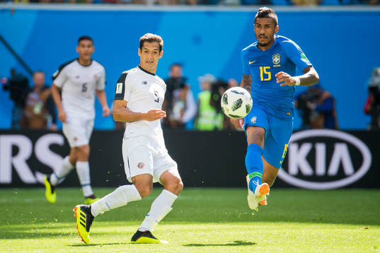 Celso Borges of Costa Rica and Paulinho of Brazil