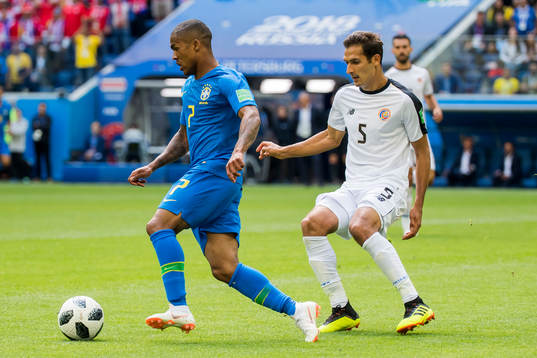 Douglas Costa of Brazil and Celso Borges of Costa Rica