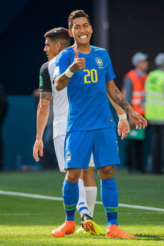 Roberto Firmino of Brazil reacts