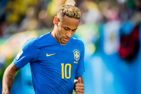 Neymar of Brazil looks dejected