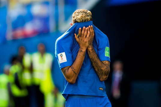 Neymar of Brazil looks dejected