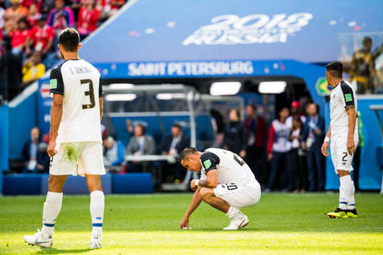David Guzman of Costa Rica looks dejected