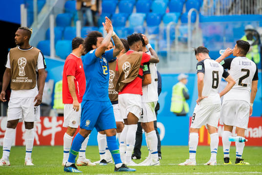 The players of Costa Rica look dejected