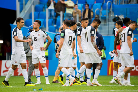 The players of Costa Rica look dejected