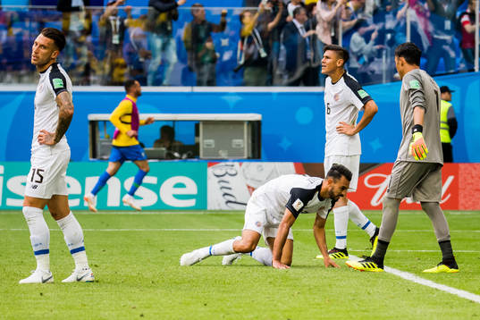 The players of Costa Rica look dejected