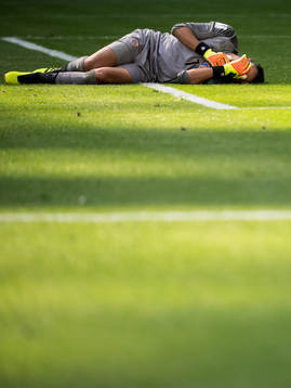 Goalkeeper Keylor Navas of Costa Rica in pain