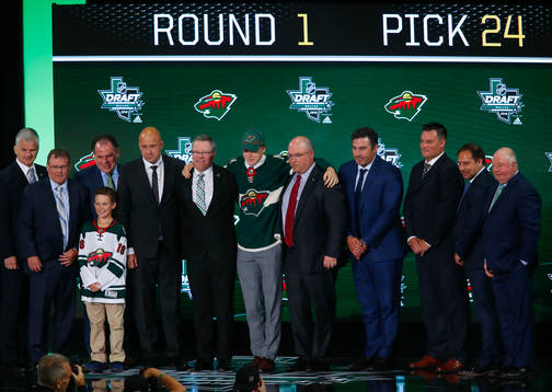 Filip Johansson of Sweden poses with team representatives