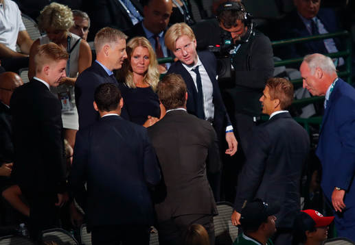 Rasmus Dahlin of Sweden is congratulated by his family