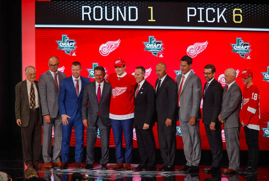 Filip Zadina of Canada poses with team representatives