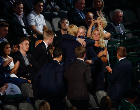 Rasmus Dahlin of Sweden hugs his family
