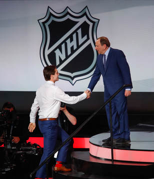 Filip Zadina of Canada greeted by NHL Commissioner Gary