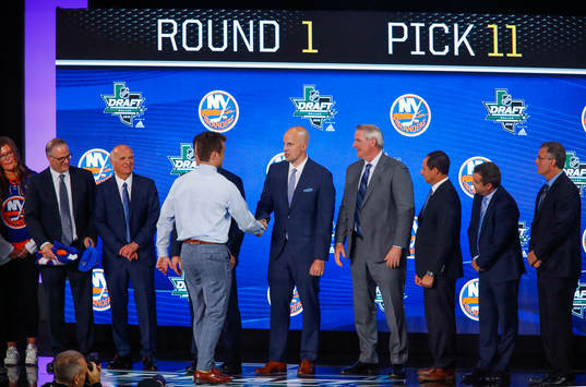 Oliver Wahlstrom of the United States shakes hands with