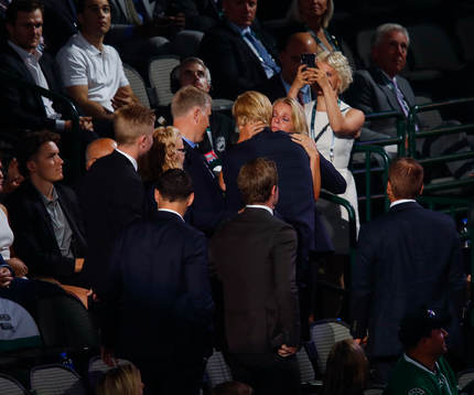 Rasmus Dahlin of Sweden hugs his family