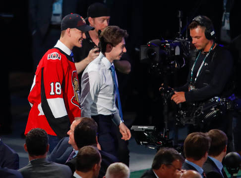 Quintin Hughes of the United States, right, is