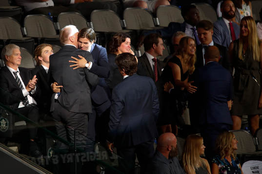 Isac Lundestrom of Sweden hugs family members