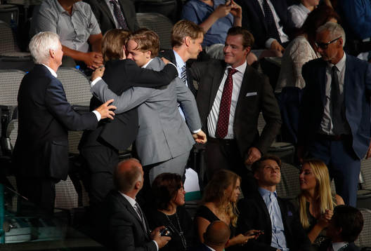 Filip Johansson of Sweden hugs family members