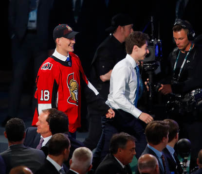 Quintin Hughes of the United States, right, is