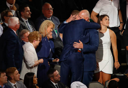 Brady Tkachuk hugs his father and U.S. Hockey Hall of Fame
