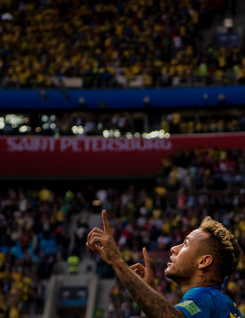 Neymar of Brazil celebrates with his teammates