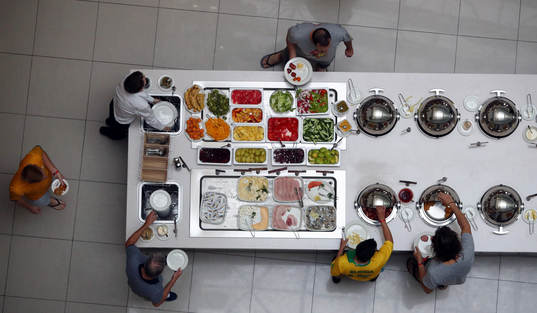 Fotboll, VM Hotel guests serve themselves breakfast at a